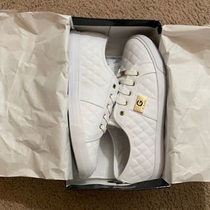 Brand new pair of white, G by Guess tennis shoes.